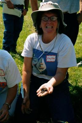 Farmer with earthworms