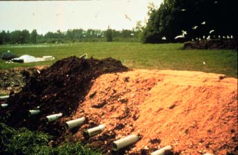 Static compost piles with passive aeration tubes