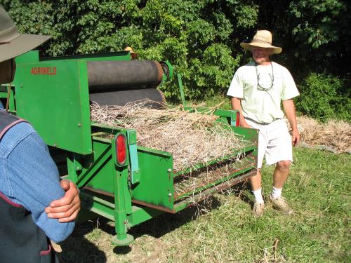 Belt thresher.